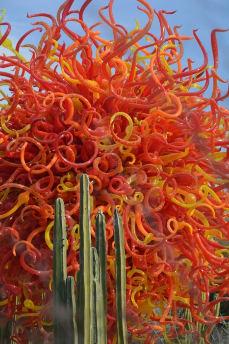 chihuly glass scupture in reds and oranges